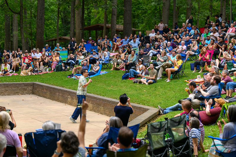 Shot of crowd and comedian interacting