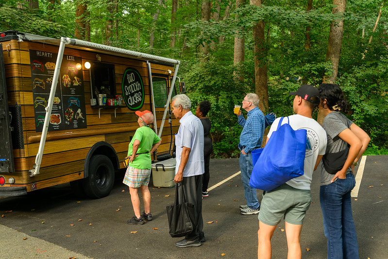 Two Smooth Dudes food truck with line of people waiting