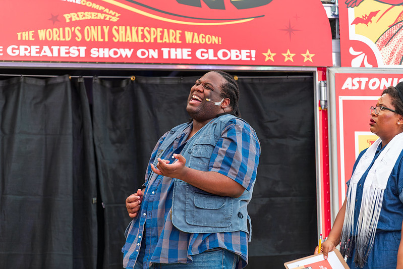 Performer belts out singing while on stage