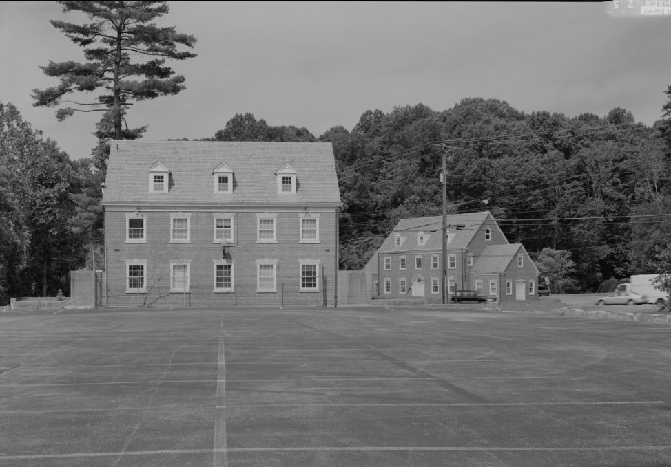 Black and white photo of the house located at Burnt Mills East Park.