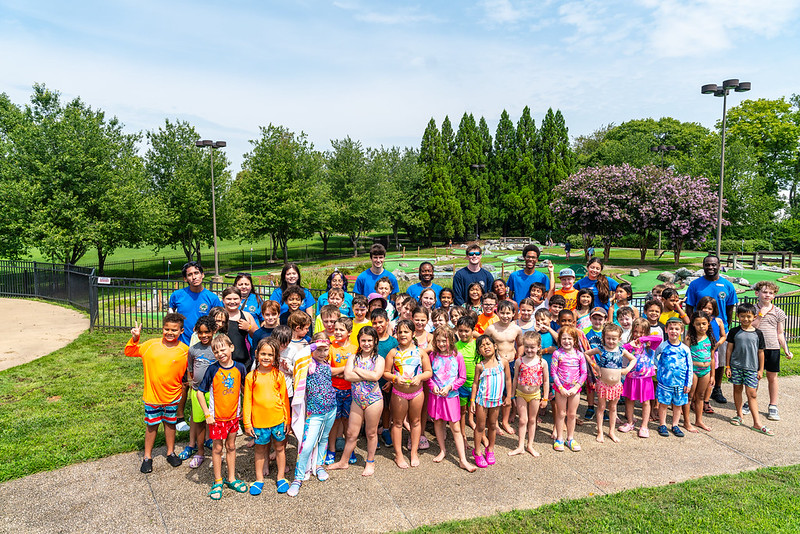 Campers and counselors posing at the Mini golf course