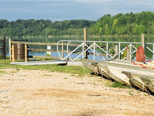 boats lined up next to loading dock