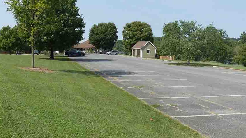 Wide view of parking lot in front of the Discovery Center at Black Hill