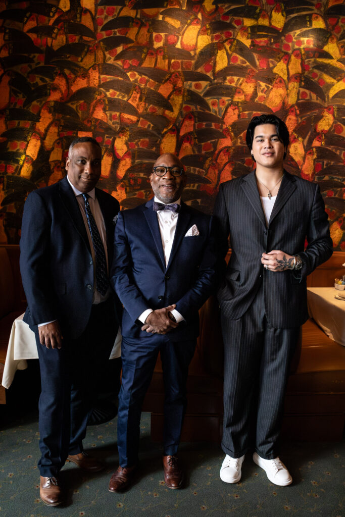 3 band members from Eric Bryd Trio pose for camera