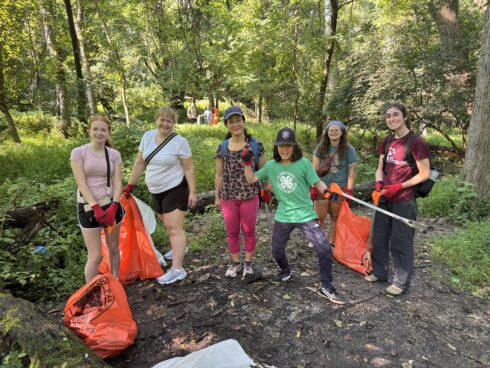 Volunteers cleaning up the Matthew Henson Trail