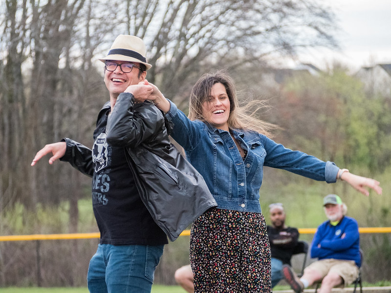 Two people dancing and smiling