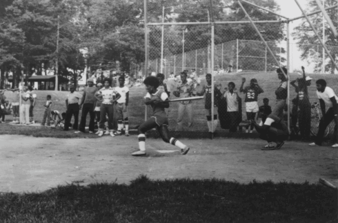 Ms. Hopkins at bat for the Emory Grove All-Stars softball team, ca. 1975, Photo by Michael Johnson