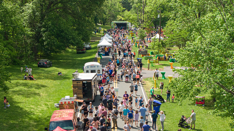 Drone shot of food trucks and crowd