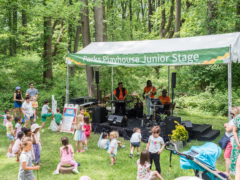 Parks Playhouse Junior Stage with kids dancing in front of it