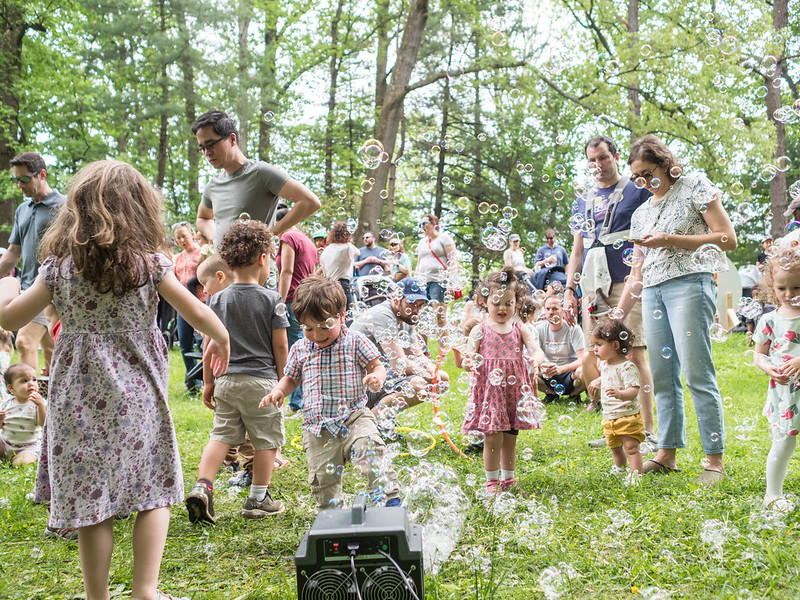 Kids play in bubbles