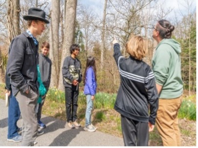 Group of people looking for birds.