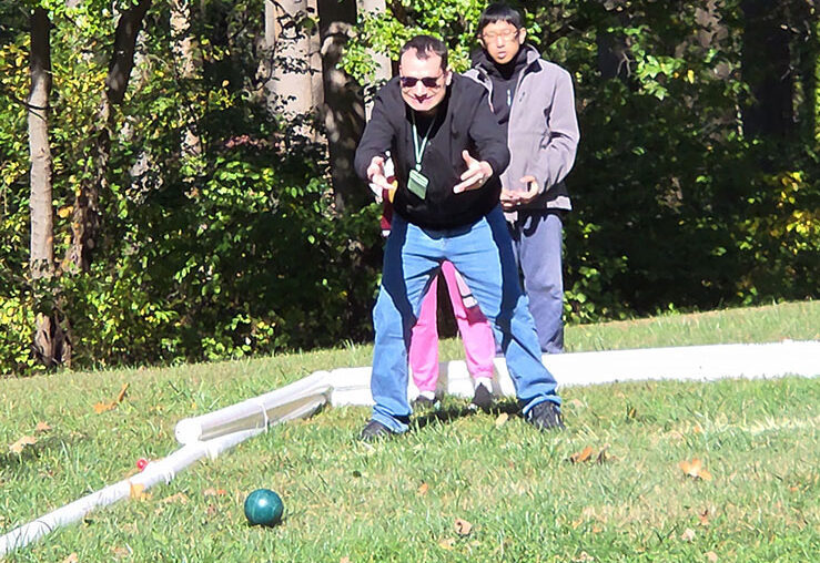 People playing Bocce.