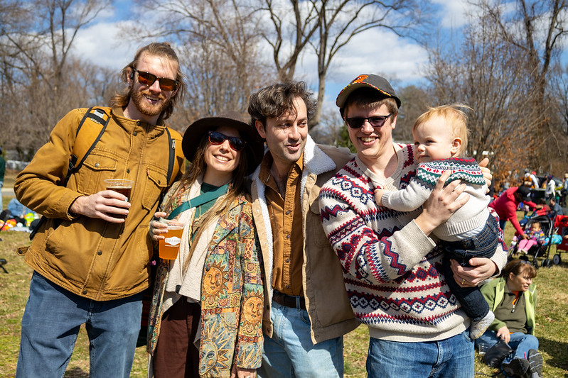 Friends smile and pose for camera