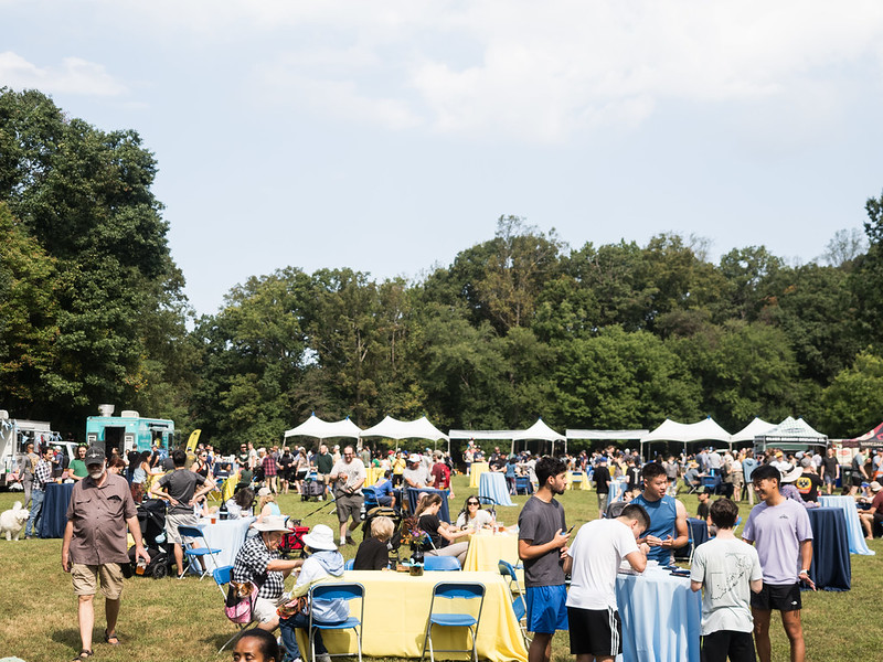 Crowd with tents in background at Parks Ale Trail