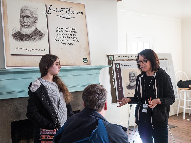 Educator speaking to guests at Josiah Henson Museum