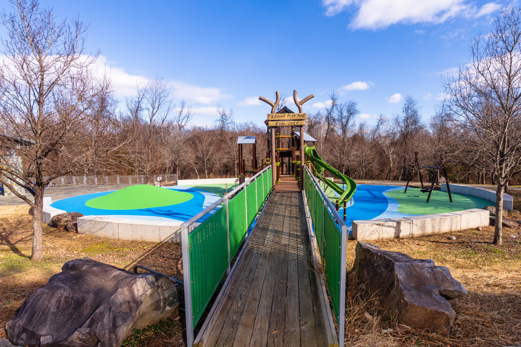 Bridge entrance to Piedmont Play Fort playground at Greenbriar Park