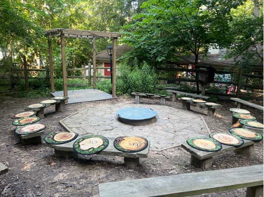 Outdoor seating around a metal fire pit