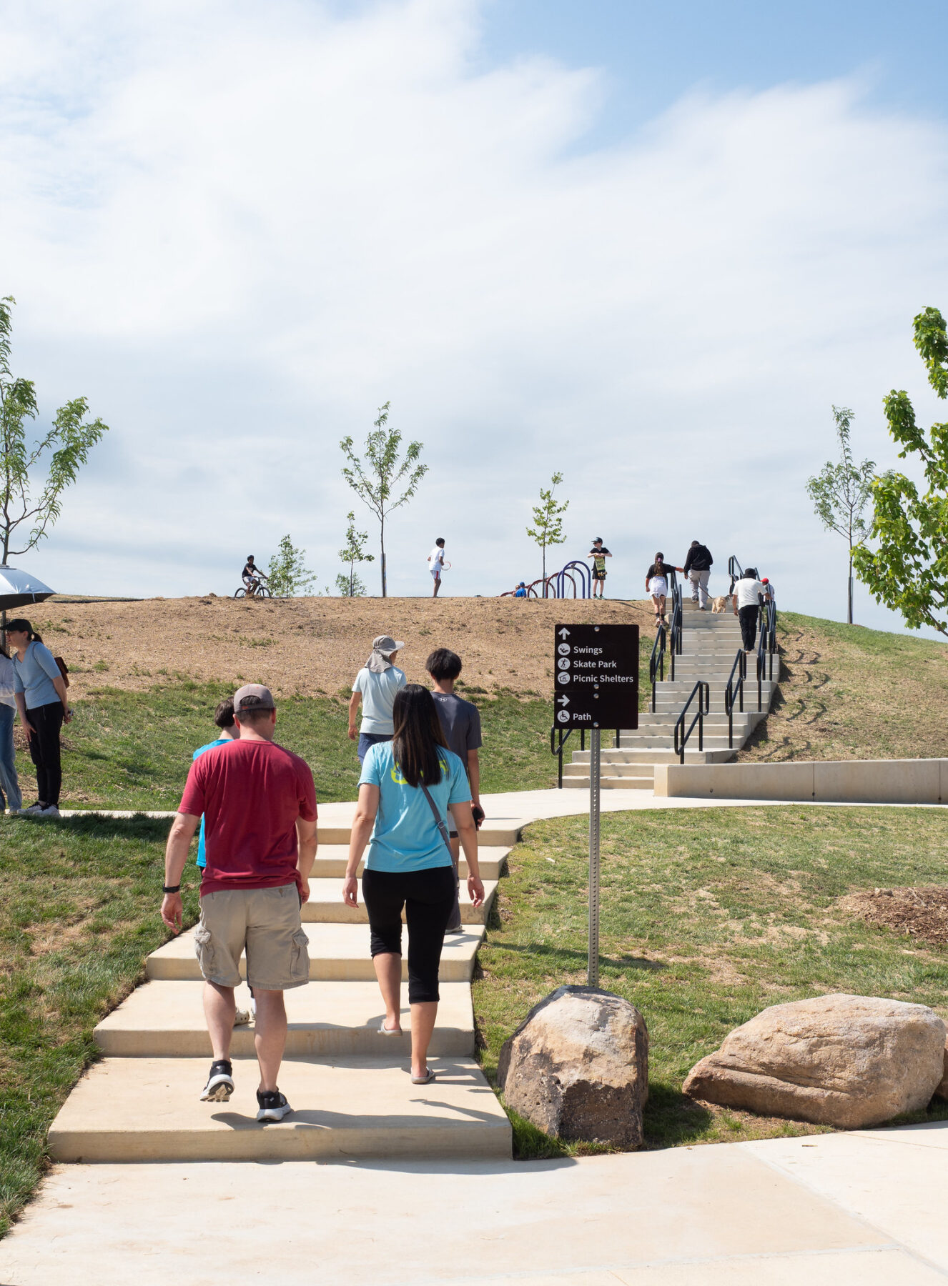 People walking up stairs at Ovid Hazen Wells Recreational Park