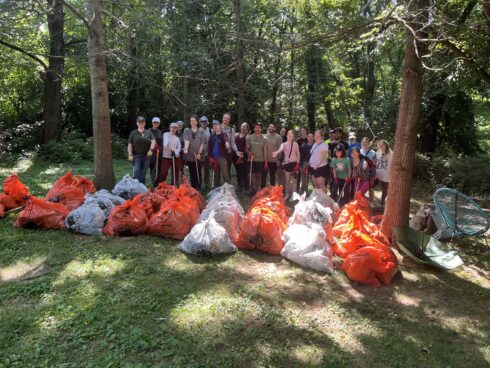 Group photo of volunteers after their park cleanup.