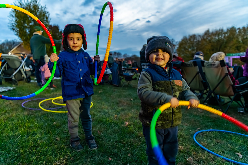 Children play with colorful hula hoops