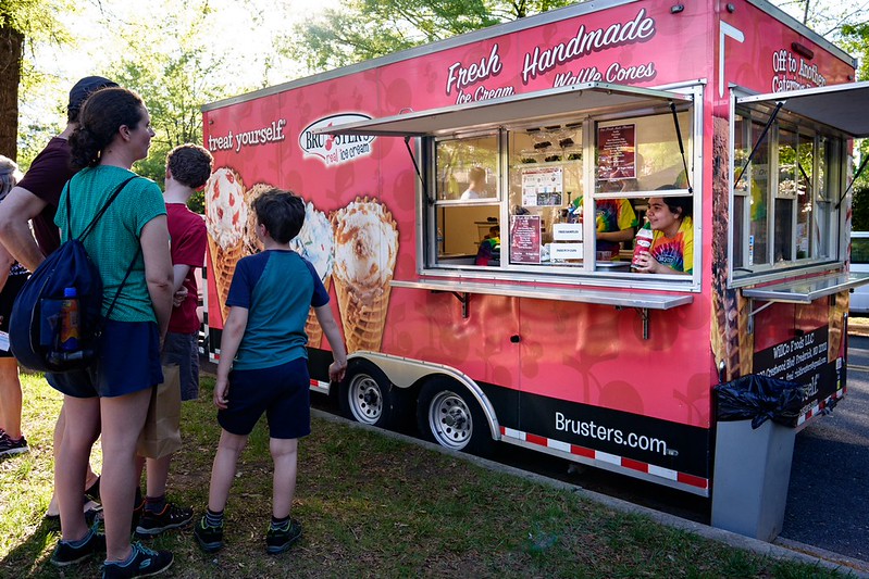 Attendees line up at ice cream truck