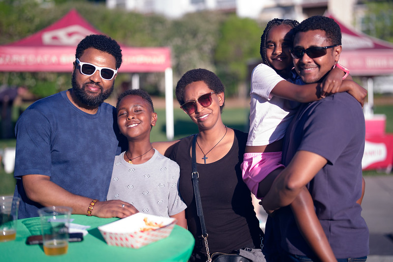 Family smiles at camera