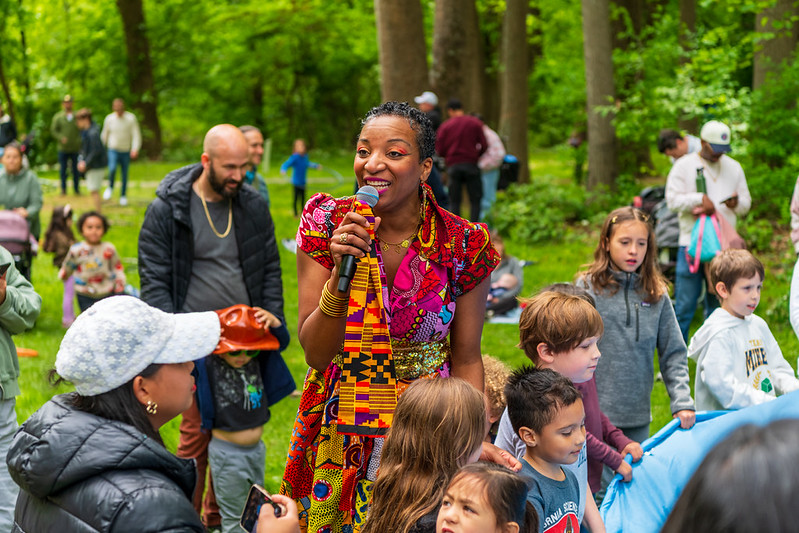 Artist Culture Queen performs holding mic