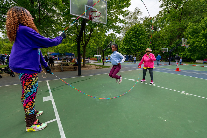 Child does double Dutch jump rope activity