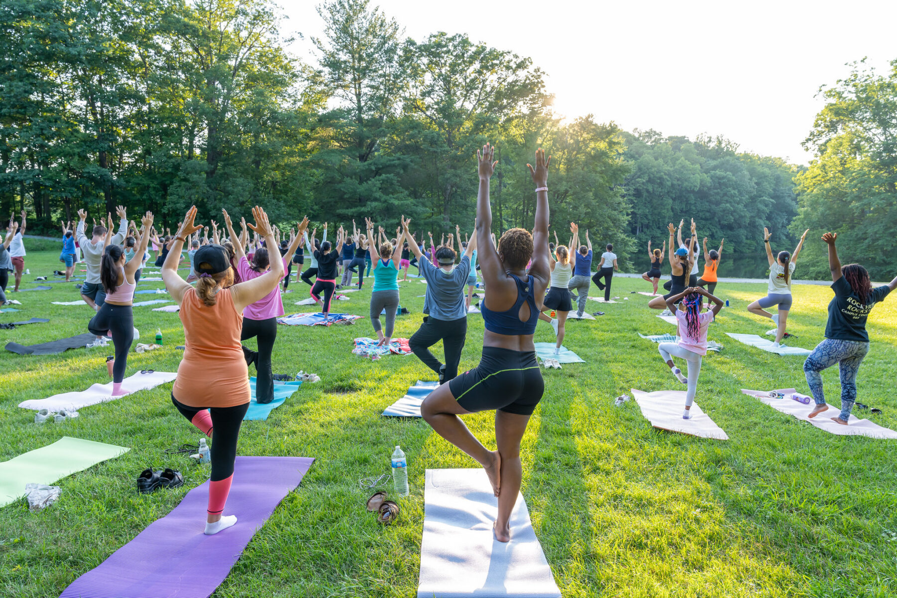 A group of people doing a yoga pose
