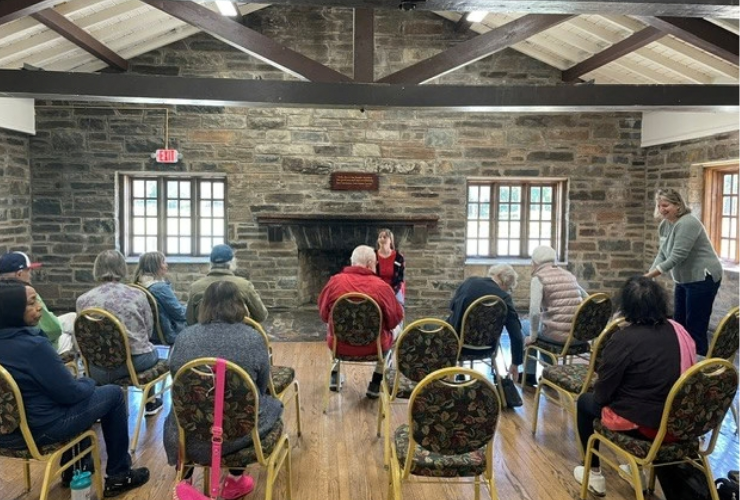 A group of participants taking part in a music activity.